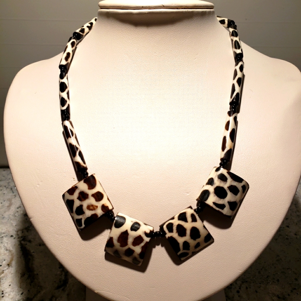 2/$29. Giraffe patterned necklace.